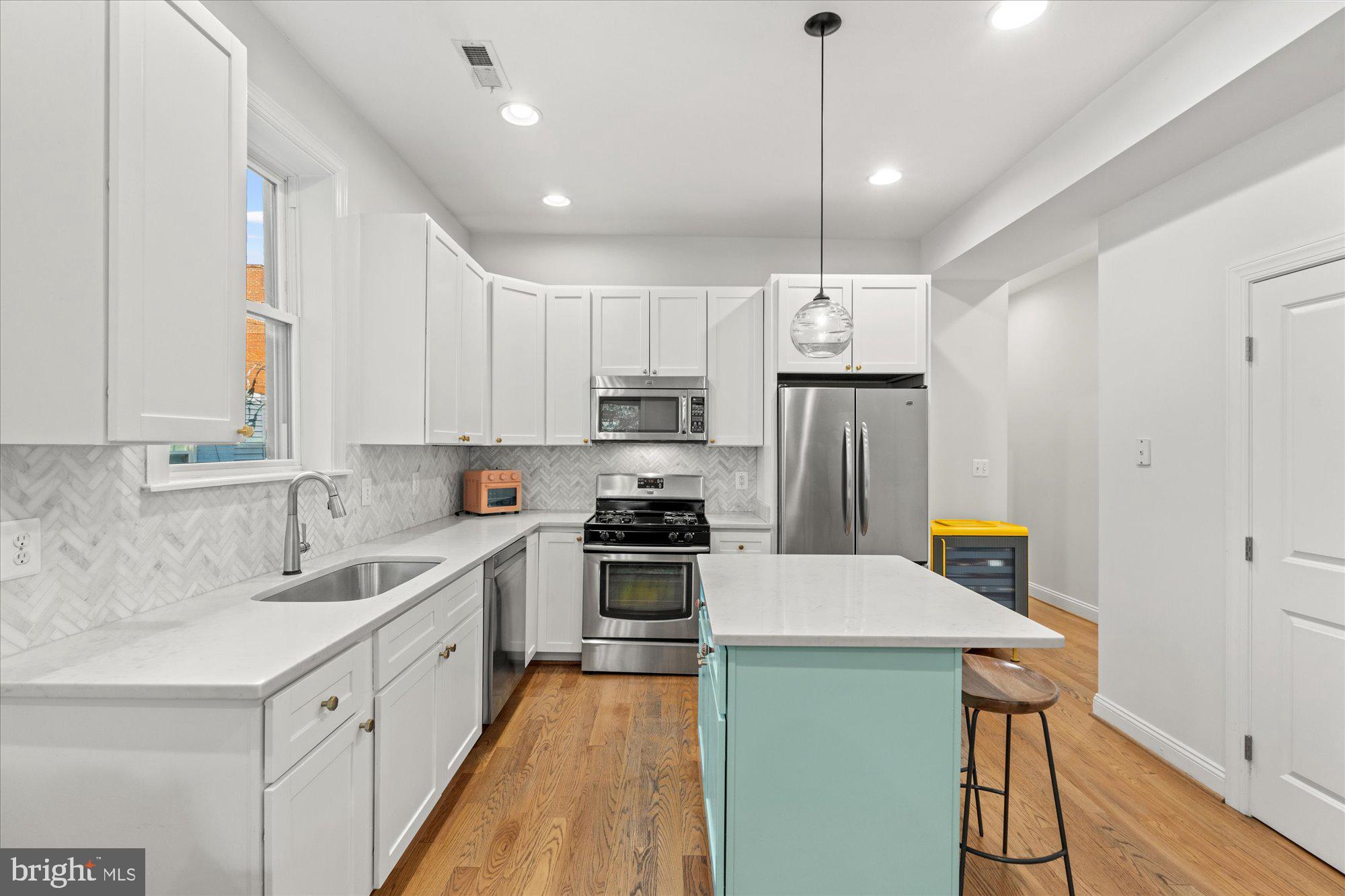 907 Webster Street Northwest, Unit 2 Washington, DC 20011 - Photo 6 of 22 Plenty of countertop and cabinet storage