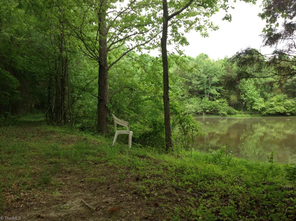 13-acres Madison Road Mocksville, NC 27028 - Photo 18 of 25 Bring your fishing pole and sit a spell! This is the Western end of the lake near one of the possible home sites.