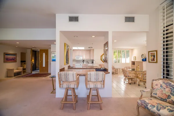 a view of a dining room with furniture