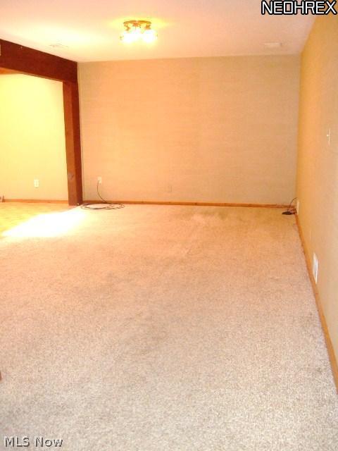 7631 Roeper Road Parma, OH 44134 - Photo 4 of 25 The mid level game room opens to the huge great room / SPA area! You won't believe this space!