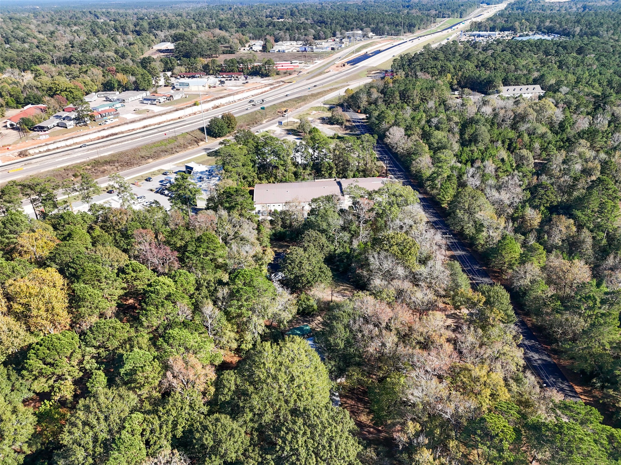 3349 Collard Road Huntsville, TX 77340 - Photo 16 of 22 an aerial view of a houses with a yard