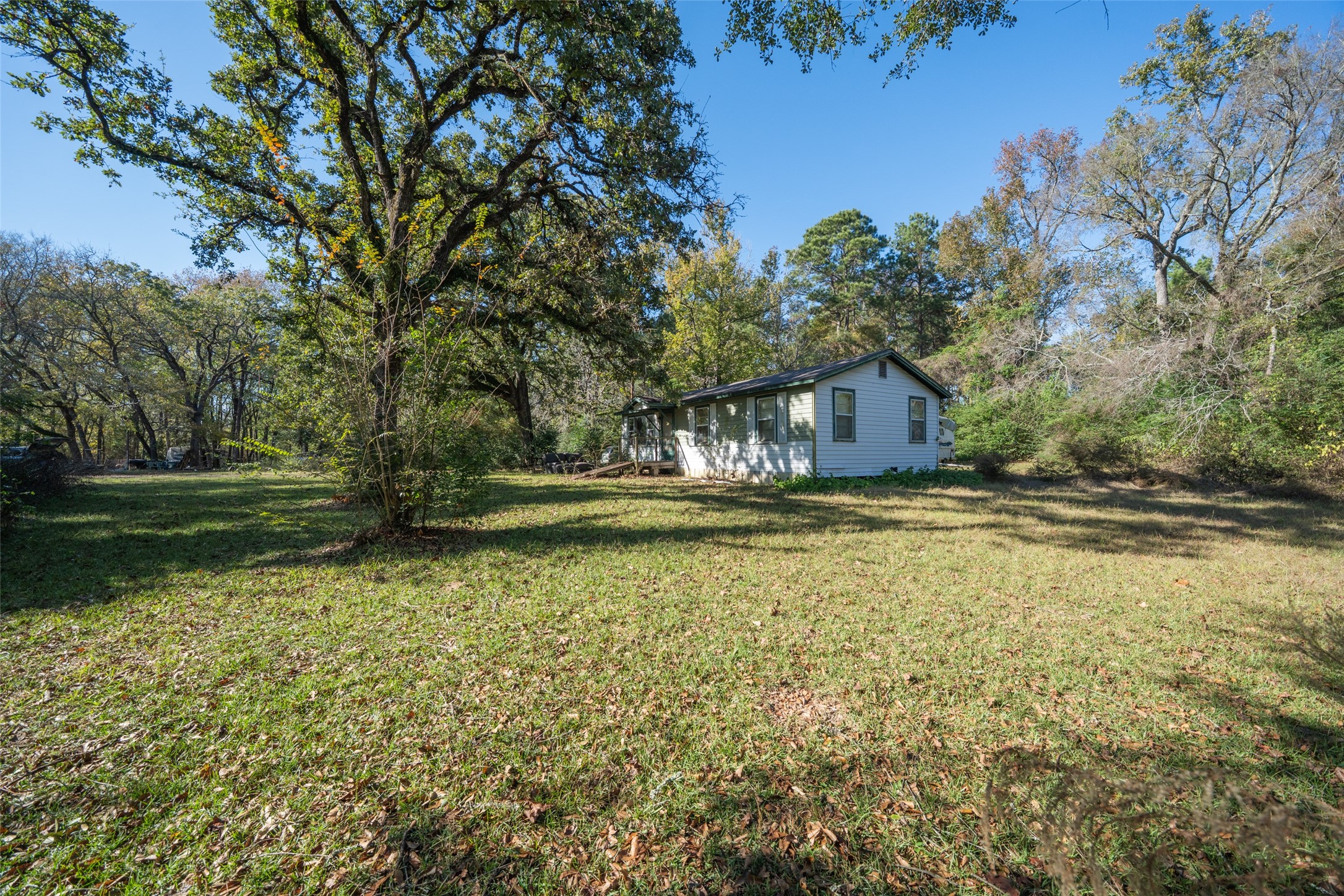 3349 Collard Road Huntsville, TX 77340 - Photo 21 of 22 a house view with a trees in the background