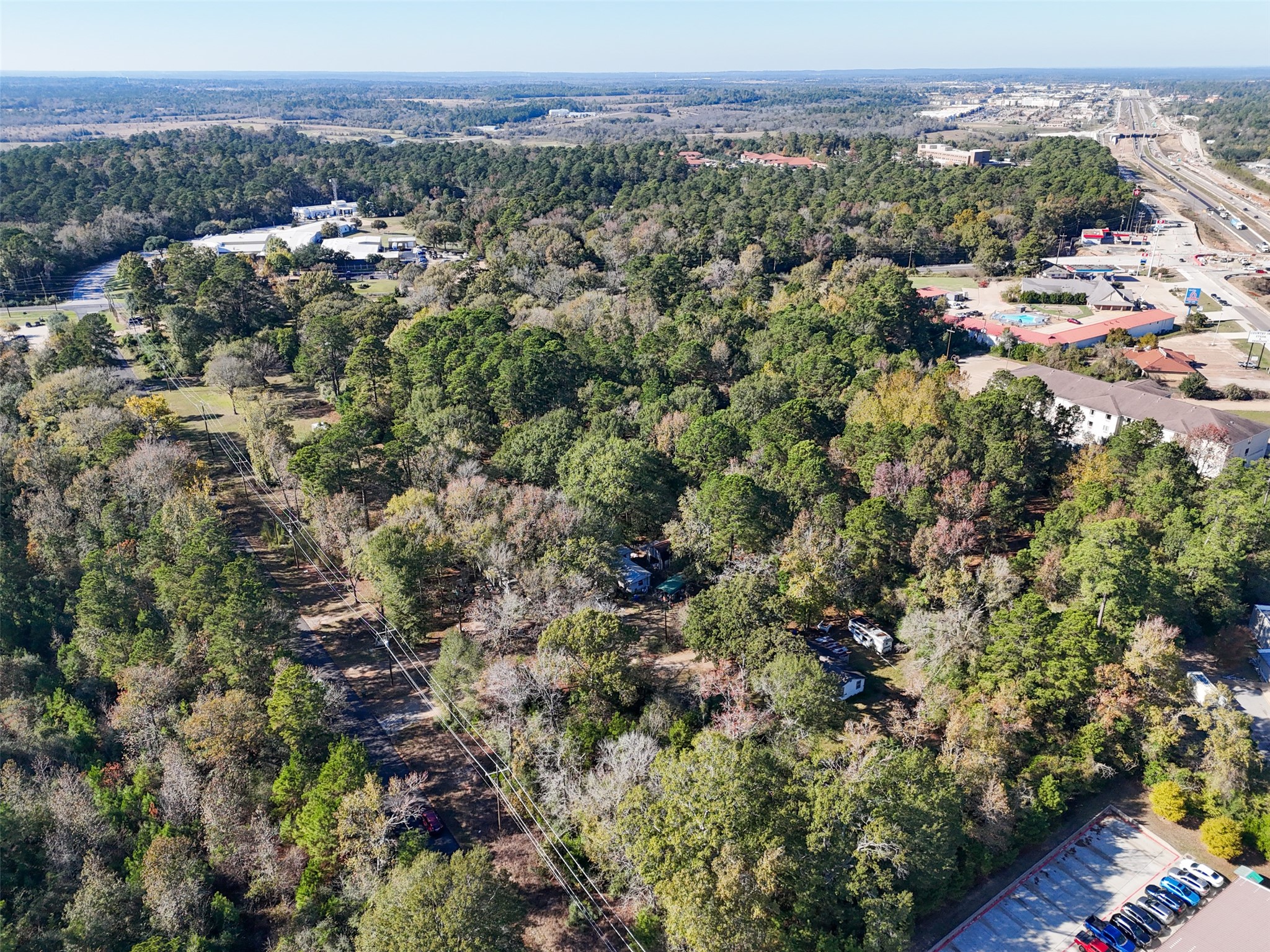 3349 Collard Road Huntsville, TX 77340 - Photo 7 of 22 an aerial view of multiple house