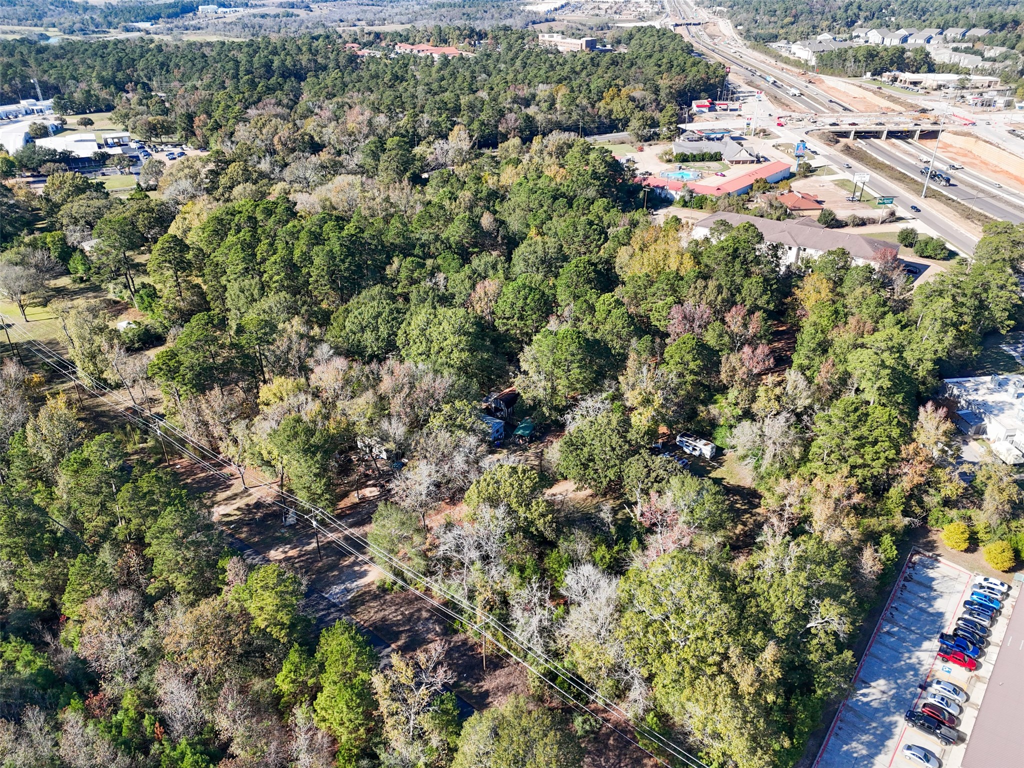 3349 Collard Road Huntsville, TX 77340 - Photo 9 of 22 an aerial view of residential house with parking and yard