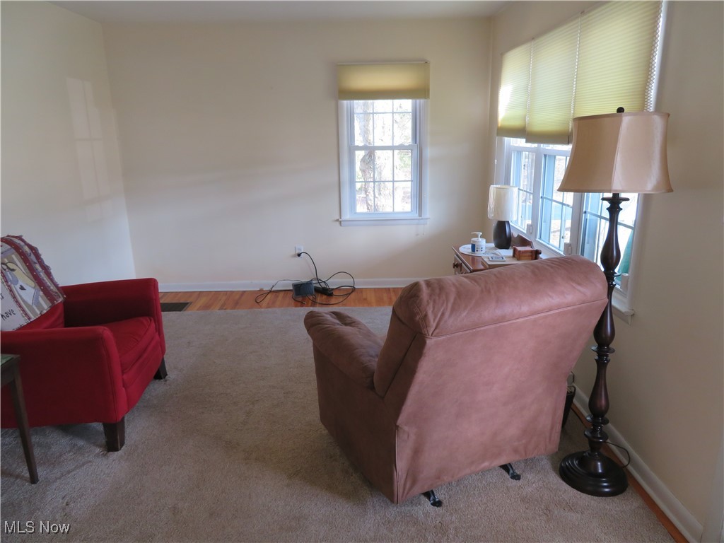 4358 Buss Road Wooster, OH 44691 - Photo 15 of 24 Living area featuring wood finished floors and baseboards