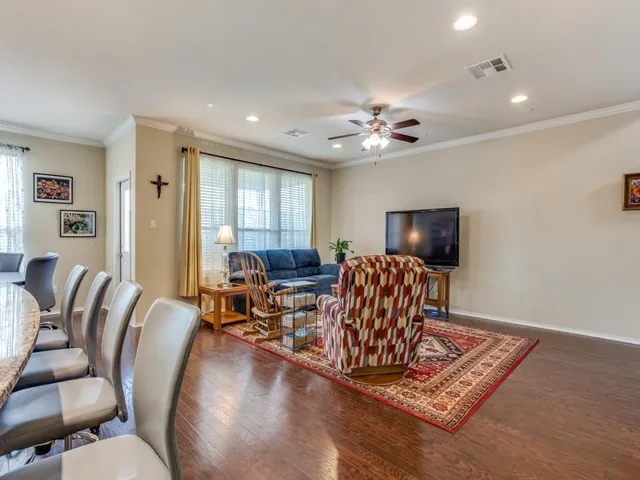 a living room with furniture or couch and a window