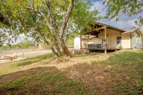 a house view with a outdoor space