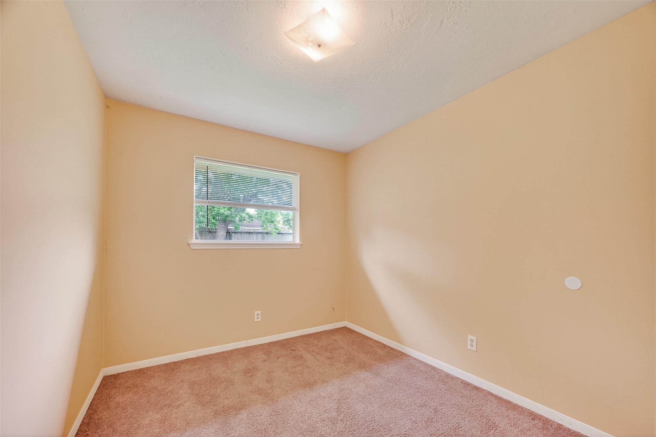 4826 Redfish Reef Drive Bacliff, TX 77518 - Photo 15 of 25 an empty room with windows