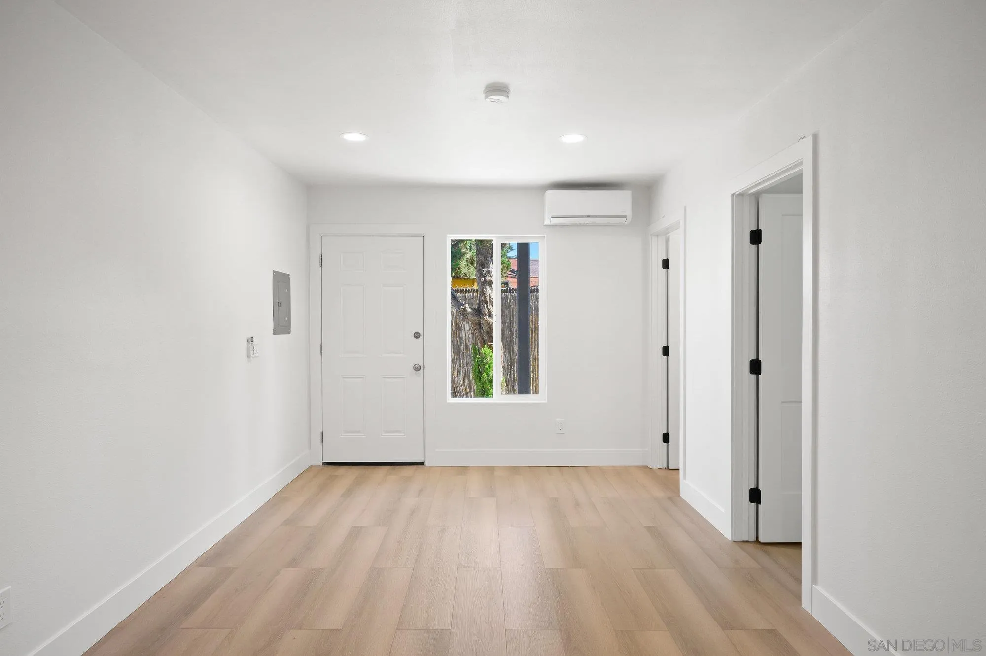329 North Pico Avenue Fallbrook, CA 92028 - Photo 19 of 23 wooden floor in an empty room with a window