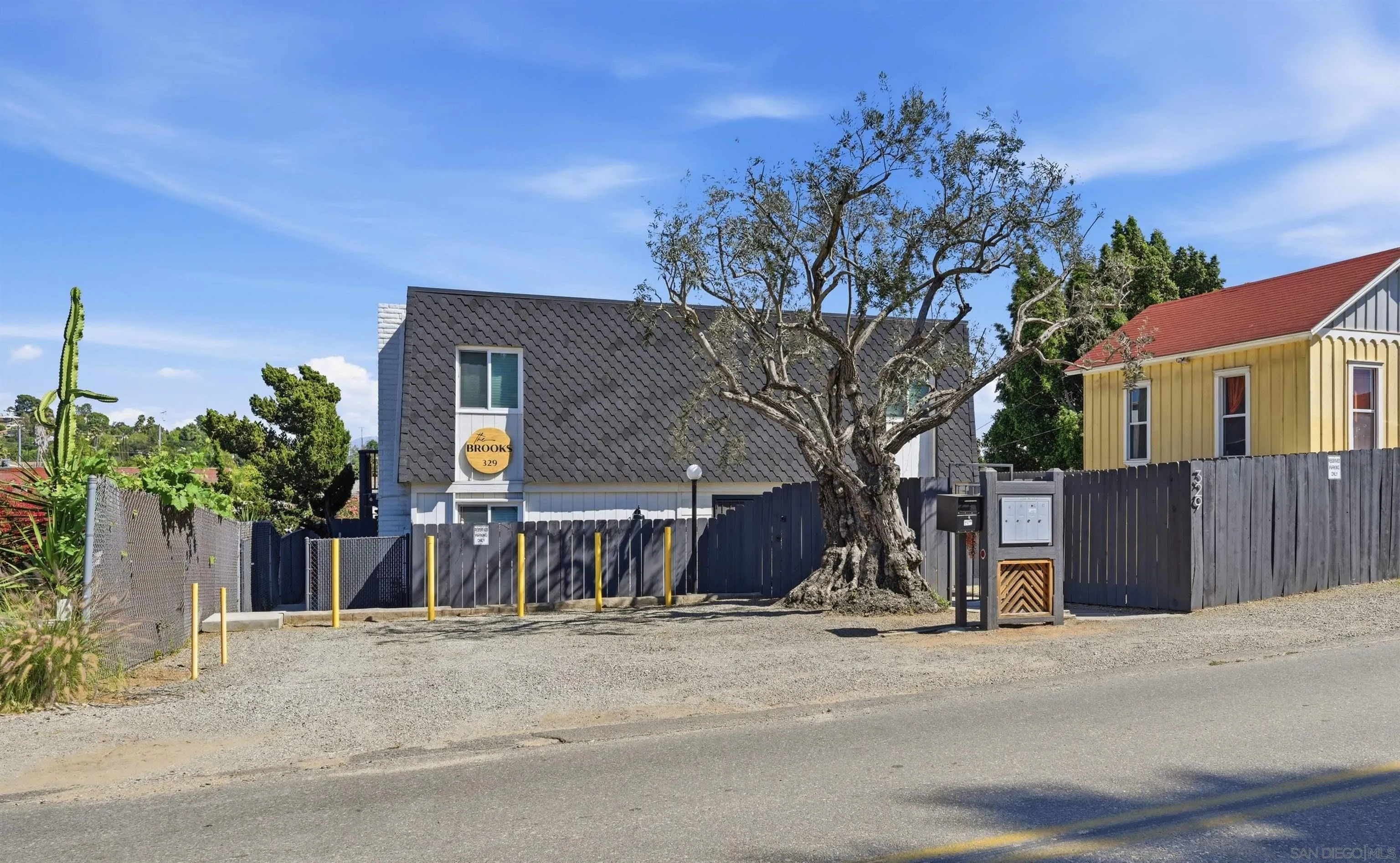 329 North Pico Avenue Fallbrook, CA 92028 - Photo 5 of 23 a view of a house with a tree in front