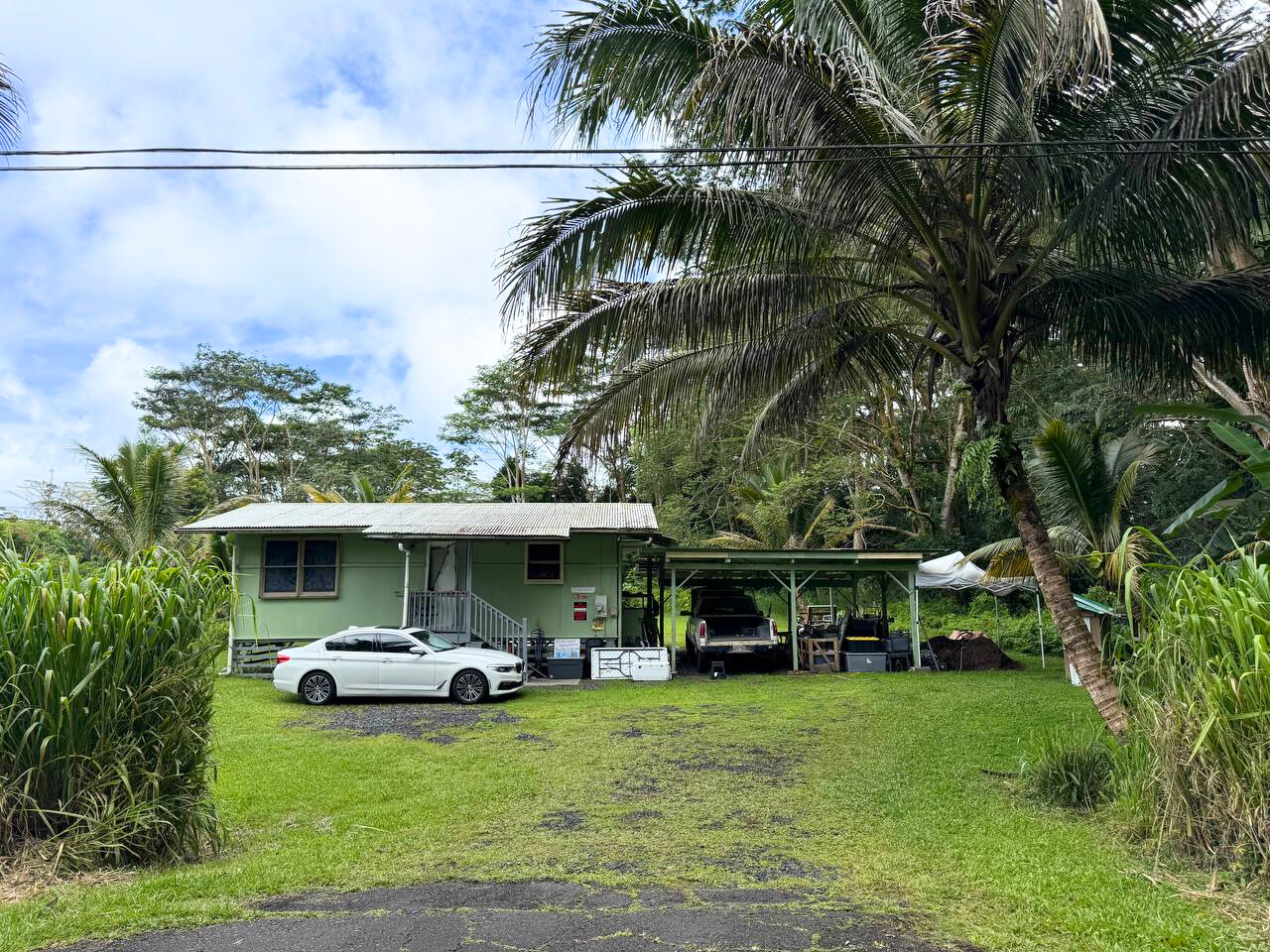 14-3276 Pualaa Road Pahoa, HI 96778 - Photo 7 of 8 a view of a chair and table on the patio
