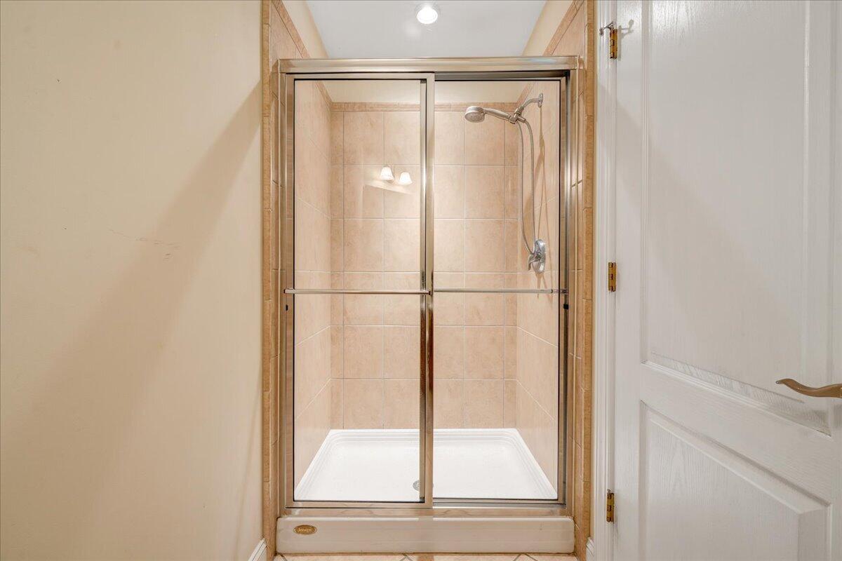 625 Frontier Way Fincastle, VA 24090 - Photo 47 of 105 a bathroom with a glass shower door