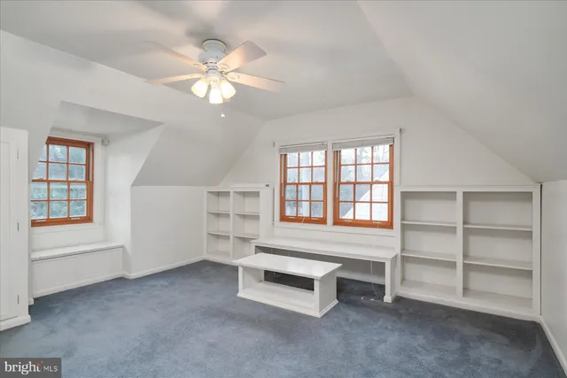 a living room with furniture and window
