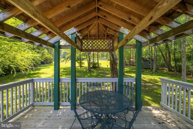 a view of a swimming pool with an outdoor space