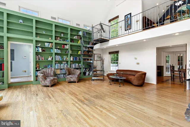 a kitchen with stainless steel appliances granite countertop a sink and a window