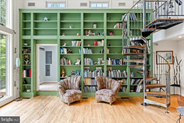 a kitchen with stainless steel appliances granite countertop a sink and a refrigerator