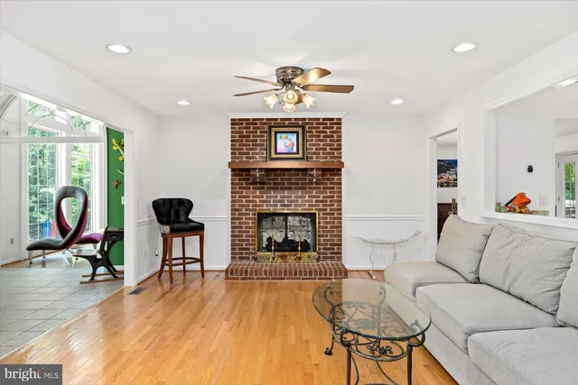 a bedroom with a large bed and a large window