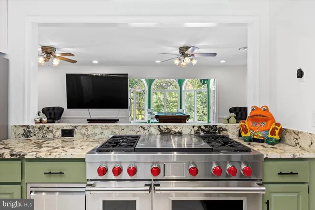 a view of an empty room with windows