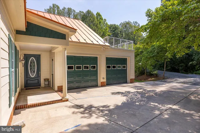 a view of a lake with houses in the back