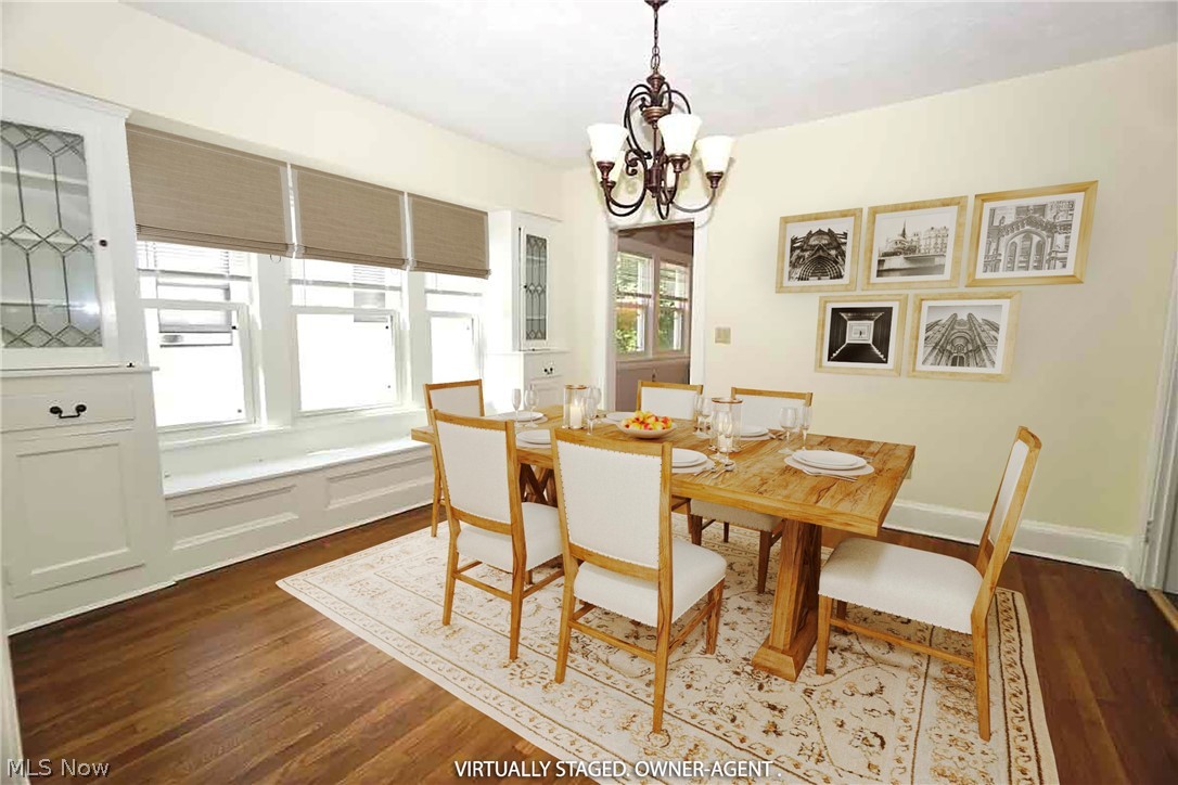2168 Edgewood Road Cleveland, OH 44118 - Photo 17 of 41 2nd fl dining room with plenty of natural light, hardwood flooring, a chandelier & window seat.