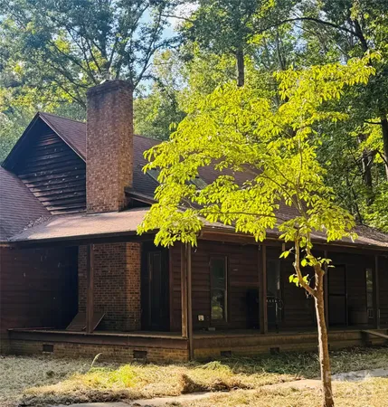 a front view of house with yard
