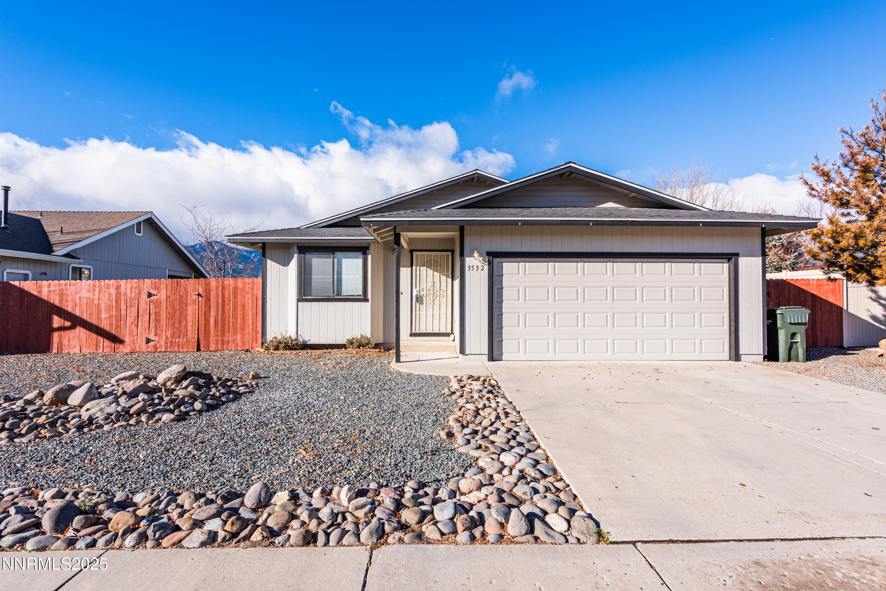 3532 Haystack Drive Carson City, NV 89705 - Photo 2 of 34 a front view of a house with a yard