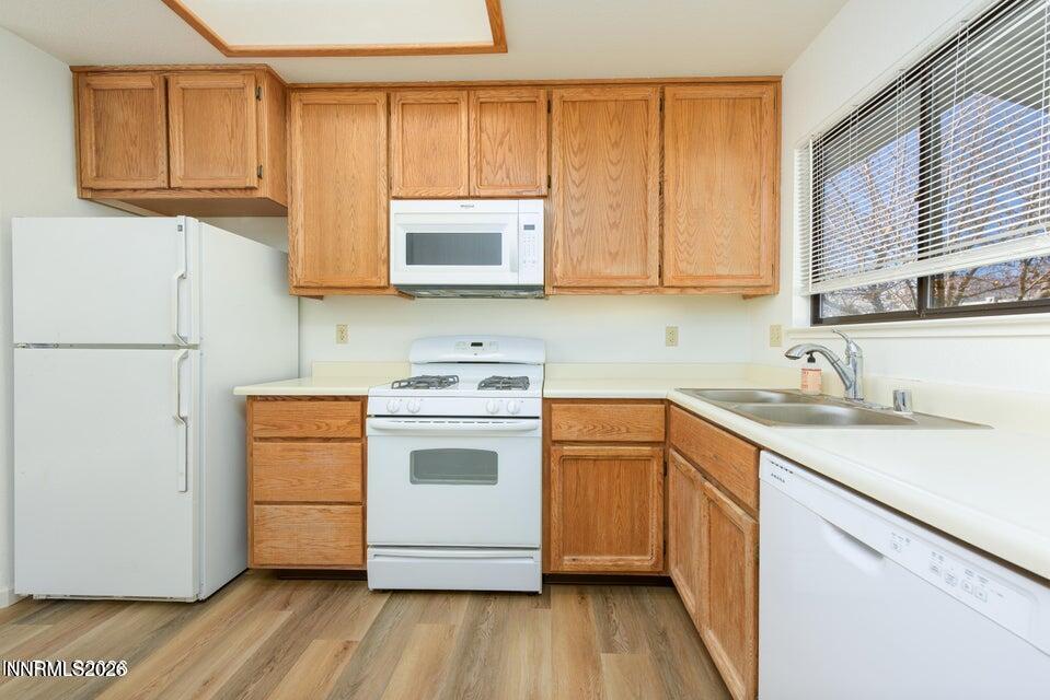 3532 Haystack Drive Carson City, NV 89705 - Photo 22 of 34 a kitchen with a sink cabinets stainless steel appliances and a window