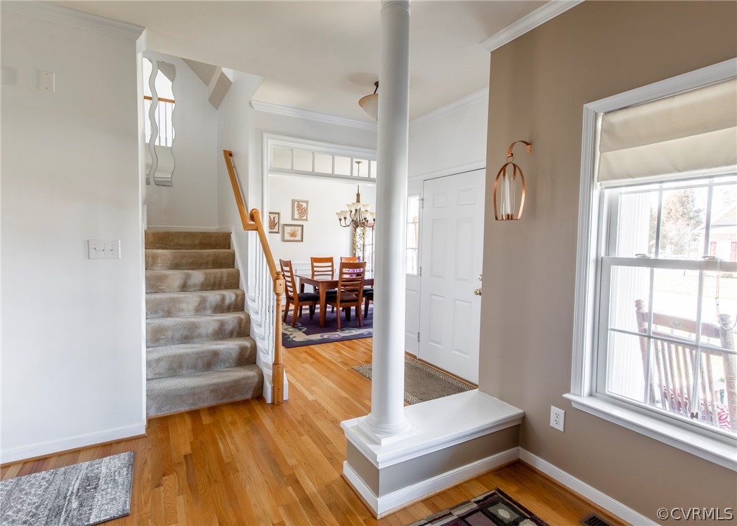 5925 Springmount Road Chesterfield, VA 23832 - Photo 5 of 35 a view of a hallway with wooden floor and staircase