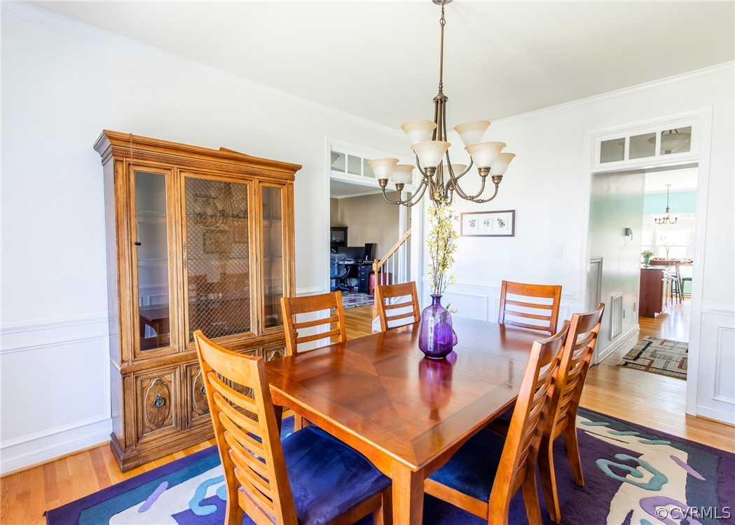 5925 Springmount Road Chesterfield, VA 23832 - Photo 8 of 35 a view of a dining room with furniture window and wooden floor