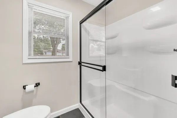 a view of a house with a garage