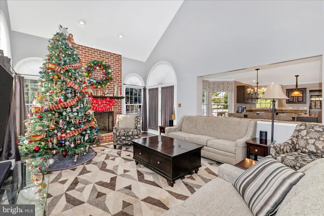 an empty room with wooden floor & closet and windows