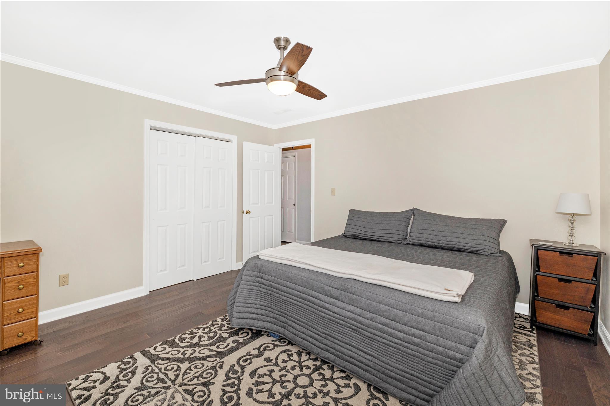 13514 Paradise Church Road Hagerstown, MD 21742 - Photo 30 of 56 a bedroom with a bed and wooden floor