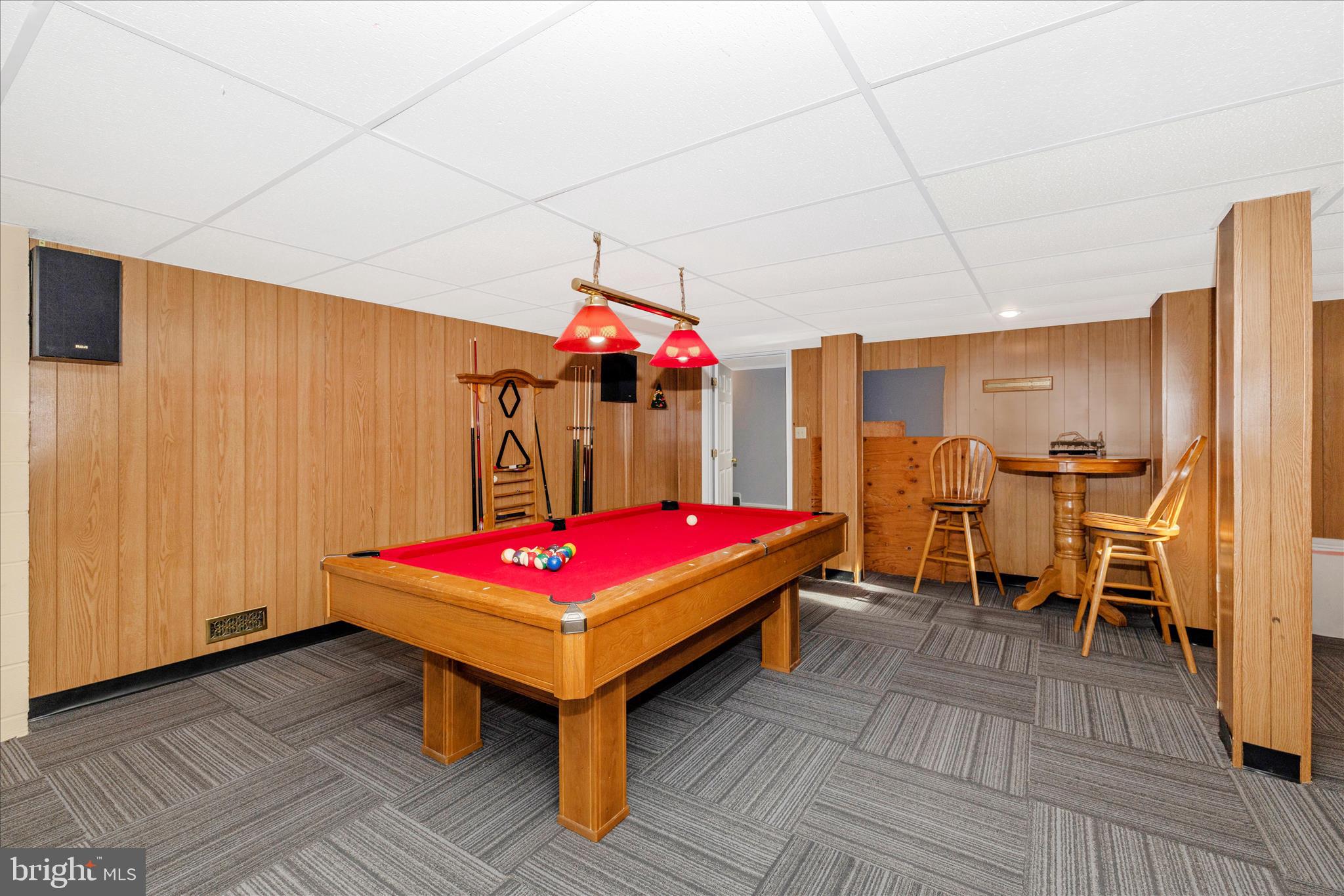 13514 Paradise Church Road Hagerstown, MD 21742 - Photo 40 of 56 a living room with furniture a table and kitchen view