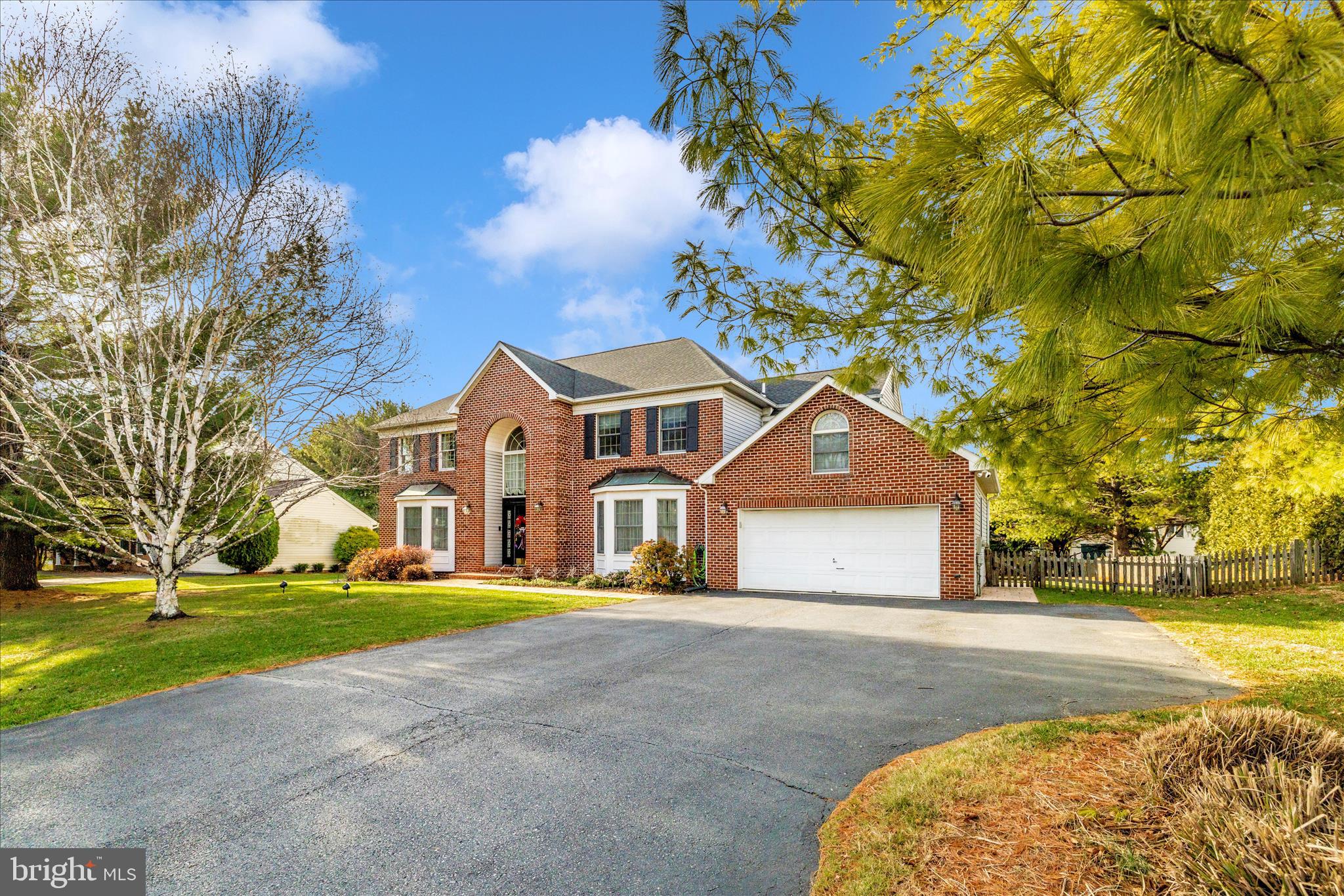 13514 Paradise Church Road Hagerstown, MD 21742 - Photo 46 of 56 a front view of a house with a yard and garage
