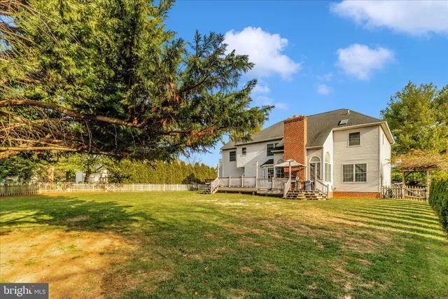 a view of a dinning table and chairs in the patio