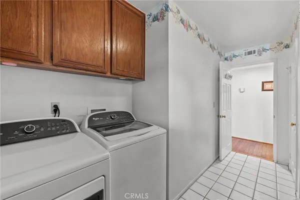a view of kitchen and utility room