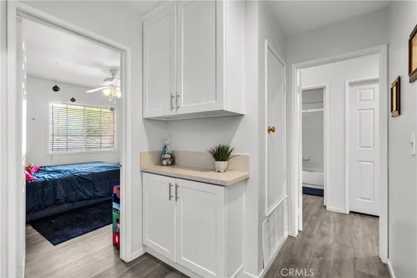 a bedroom with a bed and a couch