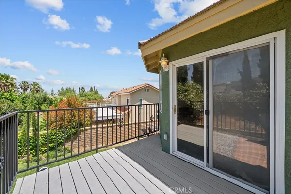 a view of a backyard with sitting area