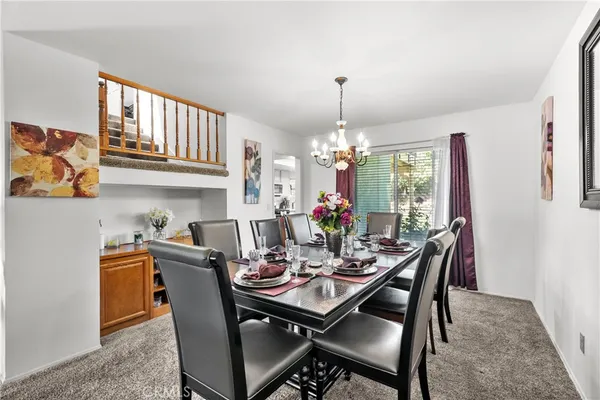 a view of a dining room with furniture