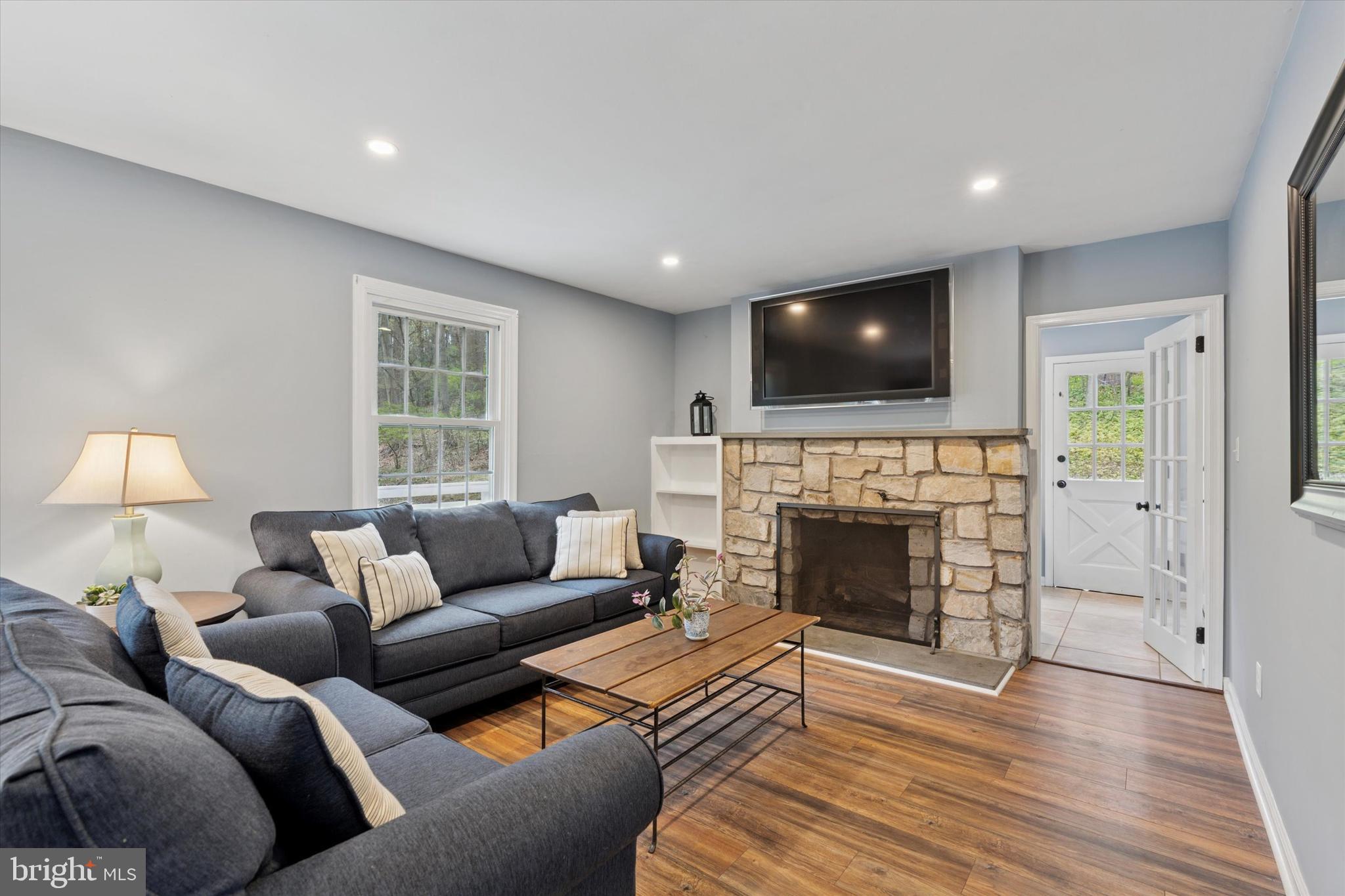 78 Peddrick Road Wayne, PA 19087 - Photo 14 of 47 a living room with furniture and a fireplace