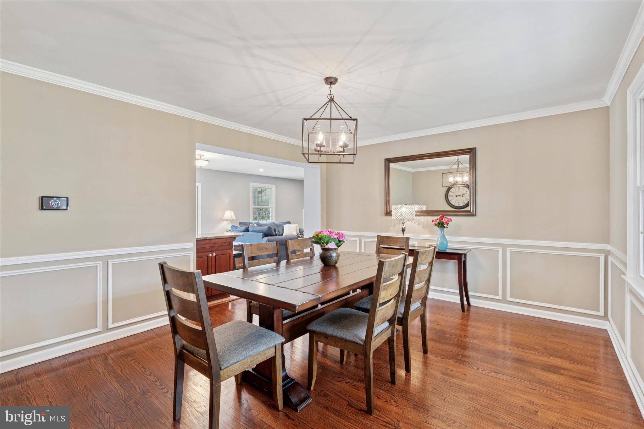 78 Peddrick Road Wayne, PA 19087 - Photo 16 of 47 a view of a dining room with furniture window and wooden floor