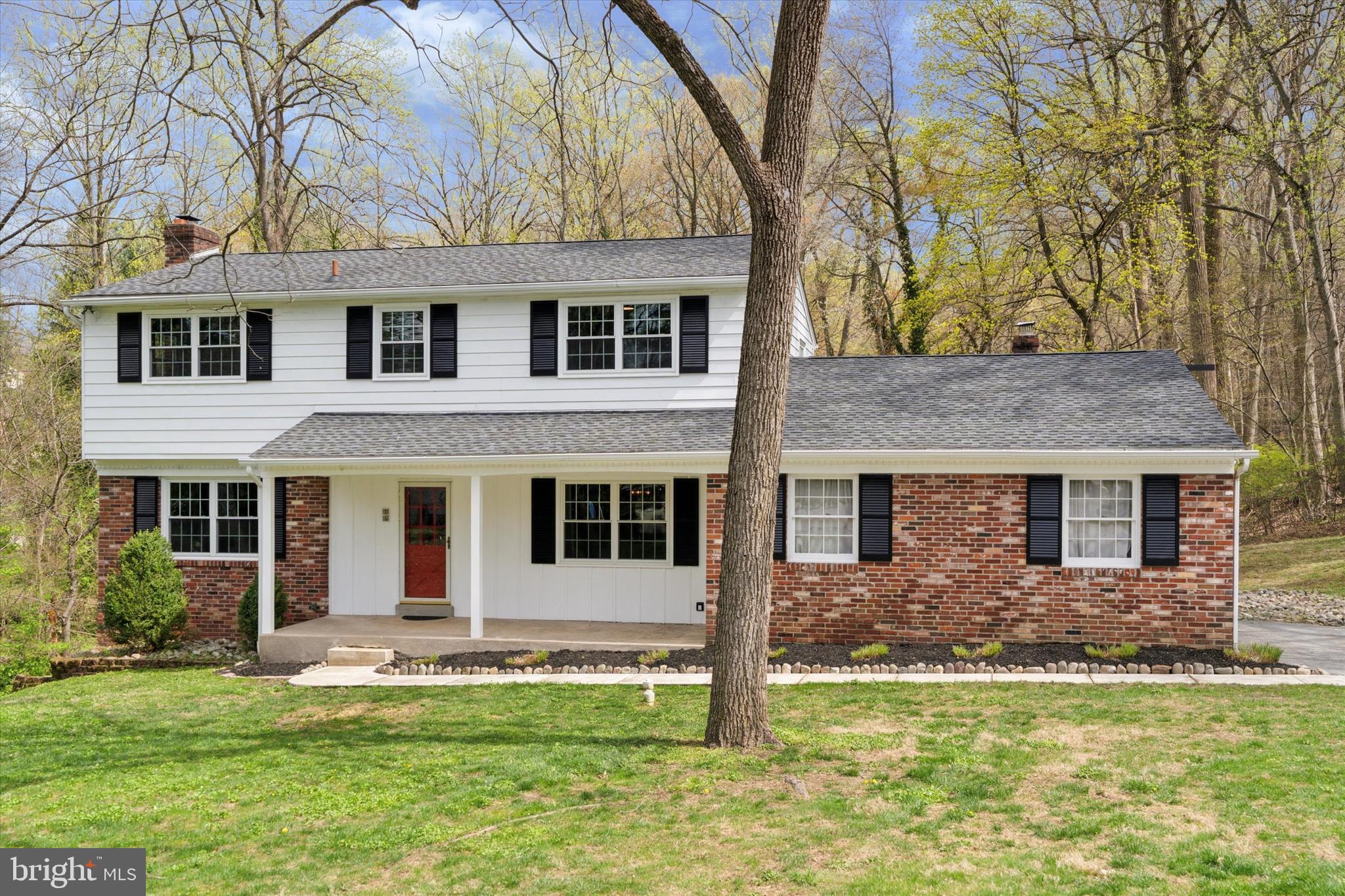 78 Peddrick Road Wayne, PA 19087 - Photo 2 of 47 a view of a house with a yard potted plants and large tree
