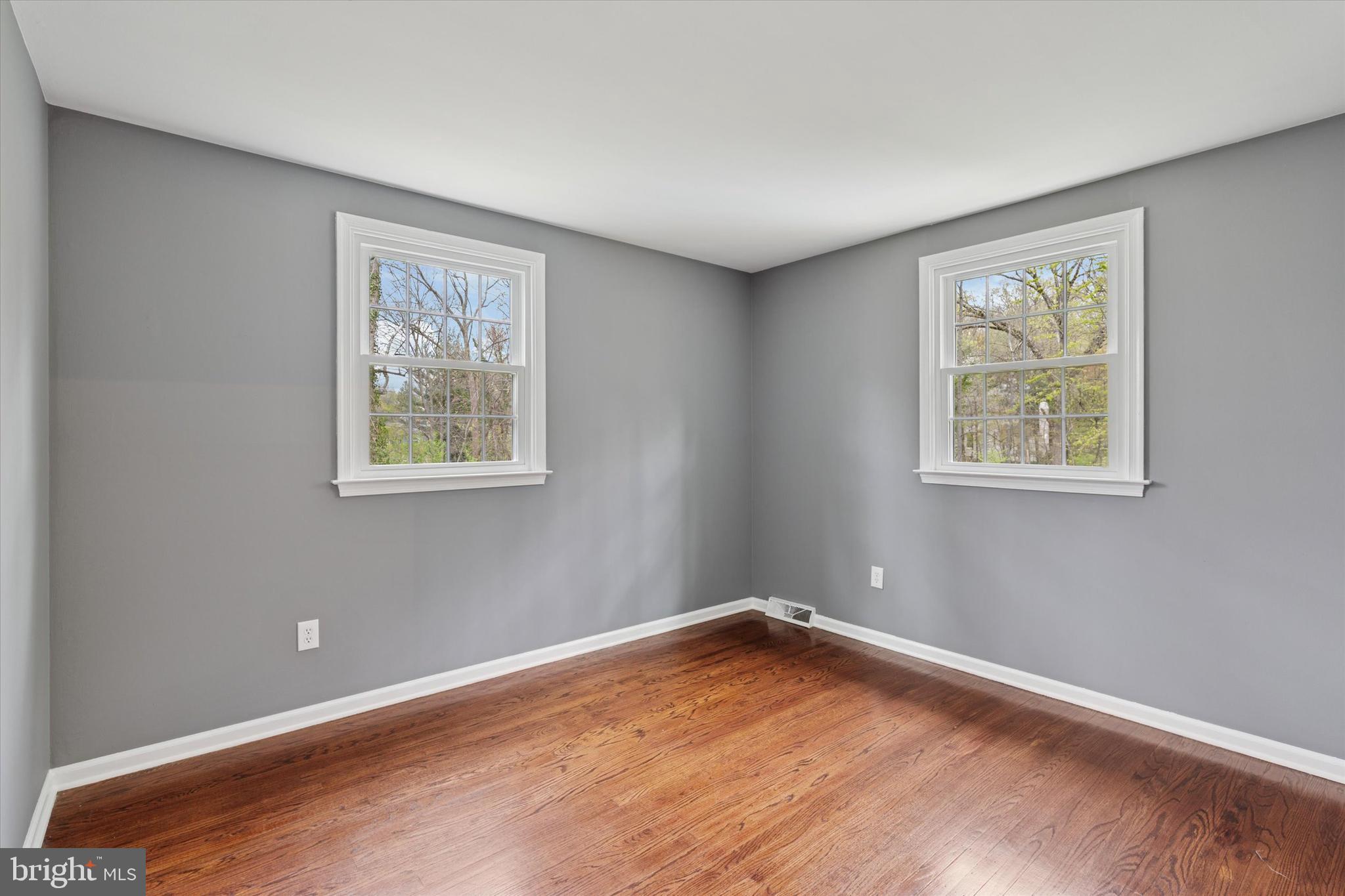 78 Peddrick Road Wayne, PA 19087 - Photo 28 of 47 a view of empty room with wooden floor