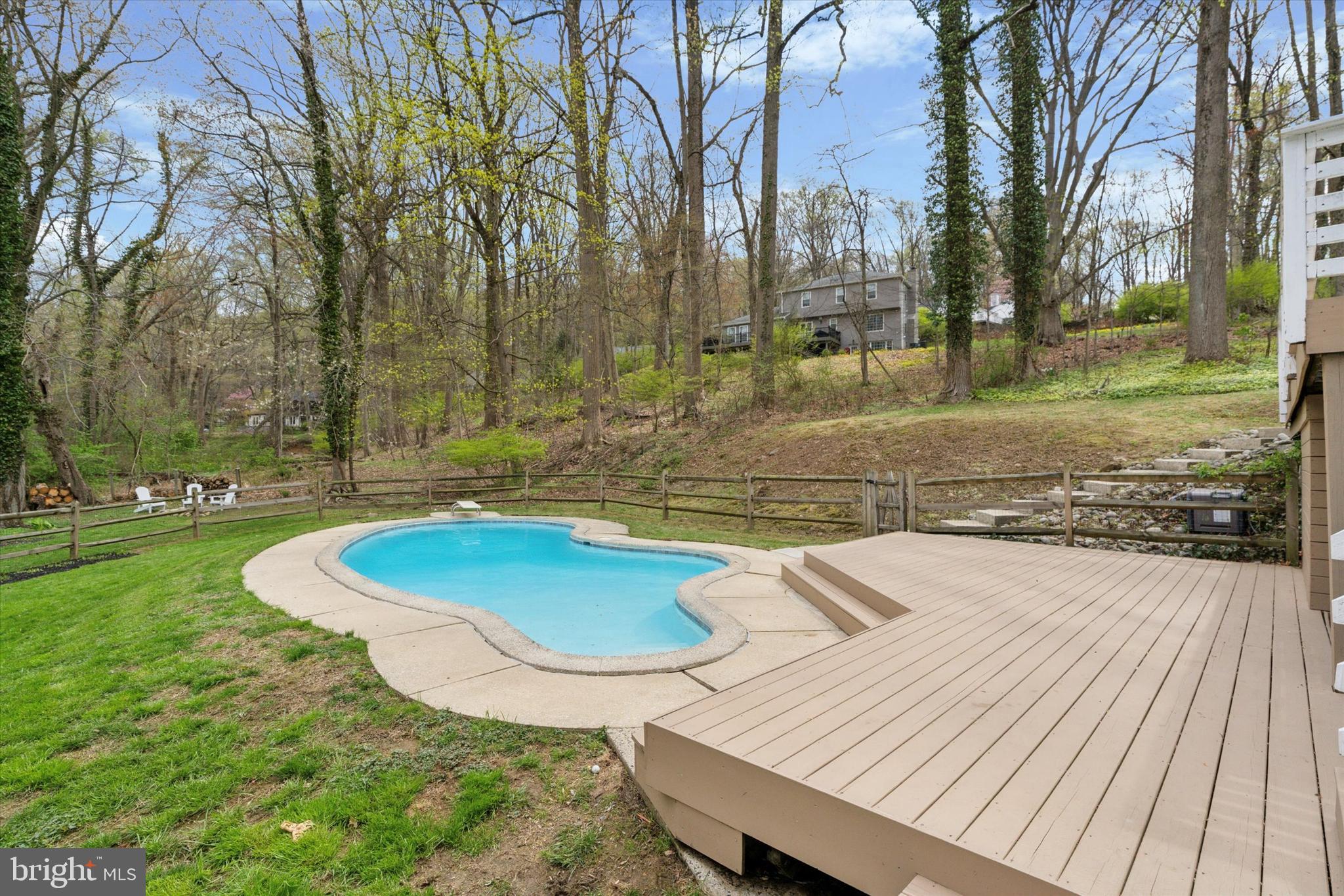 78 Peddrick Road Wayne, PA 19087 - Photo 35 of 47 a swimming pool with outdoor seating and yard