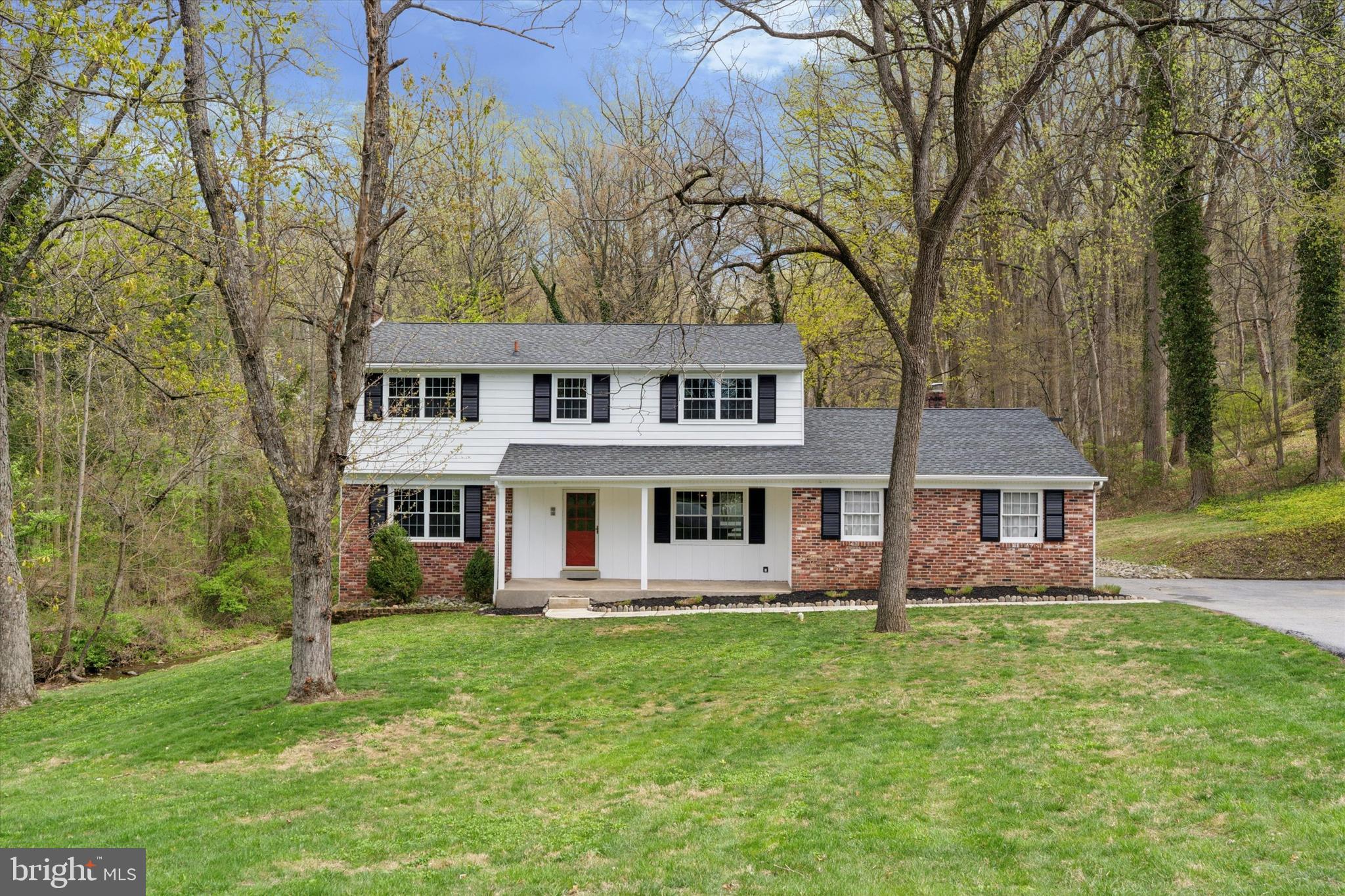 78 Peddrick Road Wayne, PA 19087 - Photo 4 of 47 front view of a house with a yard