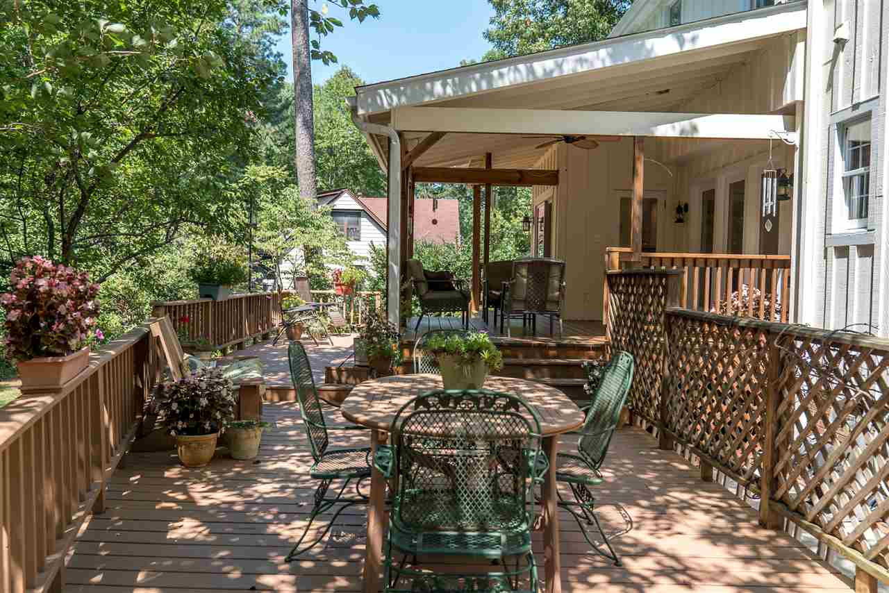 9301 Foxburrow Court Raleigh, NC 27613 - Photo 23 of 25 Everything in this home is oversized...look at this expansive deck with multiple tiers that would be perfect for entertaining, grilling out or watching games be played in the backyard! Deck