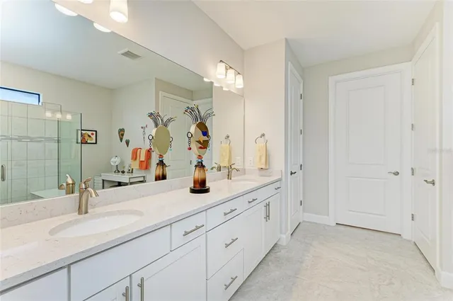 a view of a livingroom with wooden floor and windows