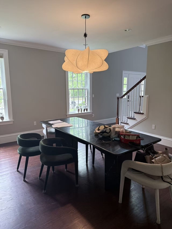 15 Cedar Road Brookline, MA 02467 - Photo 6 of 26 a table and chairs in a room