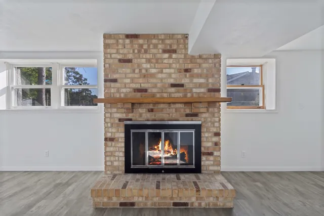 a living room with a fireplace