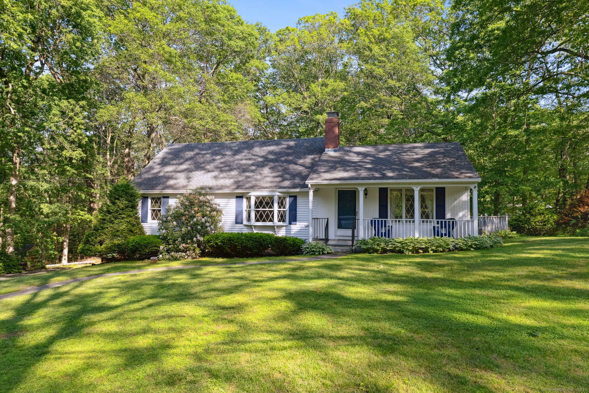 74 Pineridge Road Harwinton, CT 06791 - Photo 1 of 1 a front view of a house with a garden